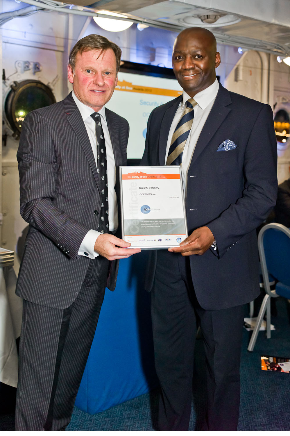 Accepting the Certificate - Photo courtesy of Safety at Sea