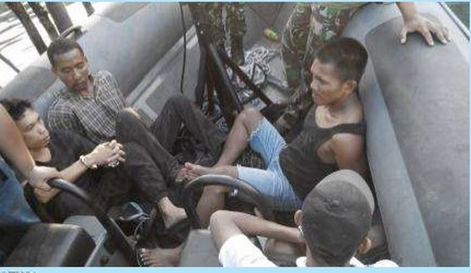 Captured Robbers in Indonesia